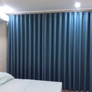 rèm vải màu xanh lắp ray định hình tạo ống đẹp ở Đà Nẵng